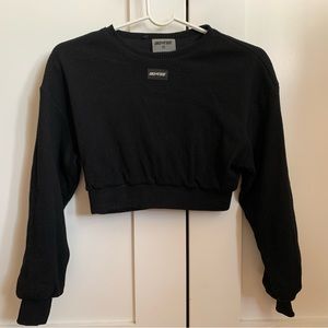Simple black cropped hoodie . Goes nice with almost everything. Great condition